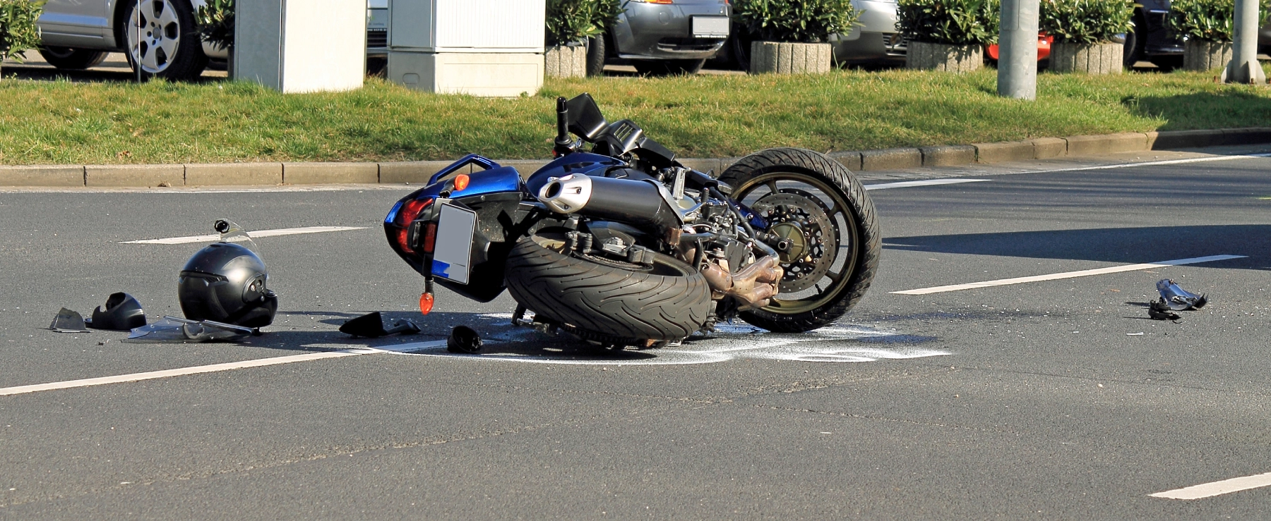 motorcycle on its side in the road