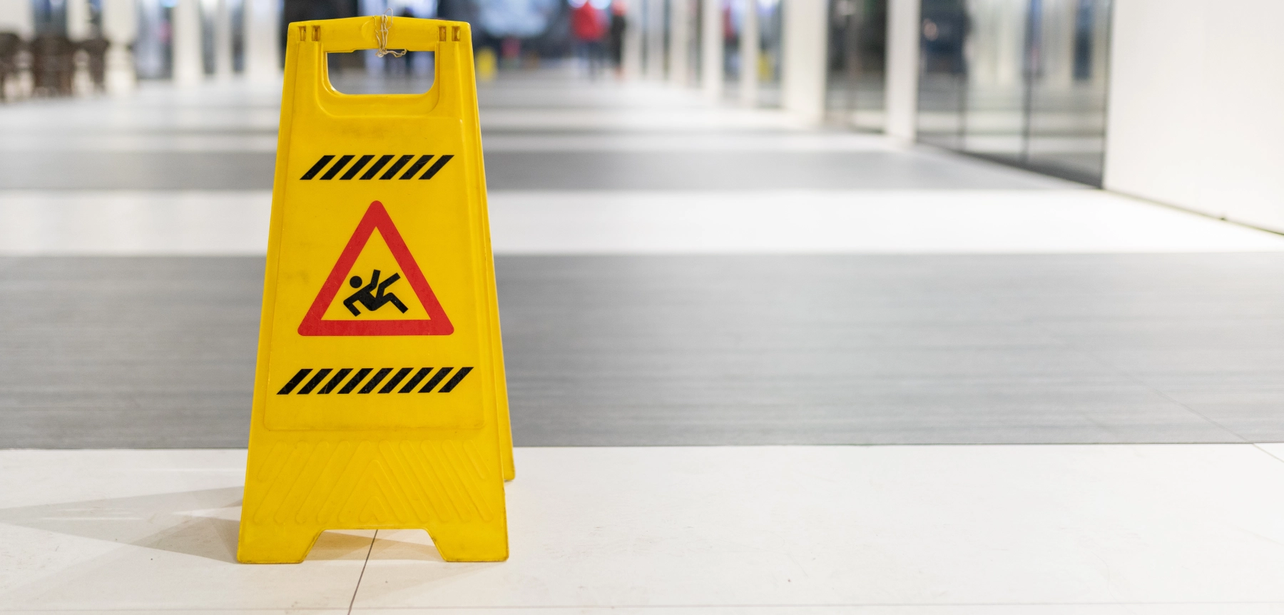 slip and fall sign on clean floor