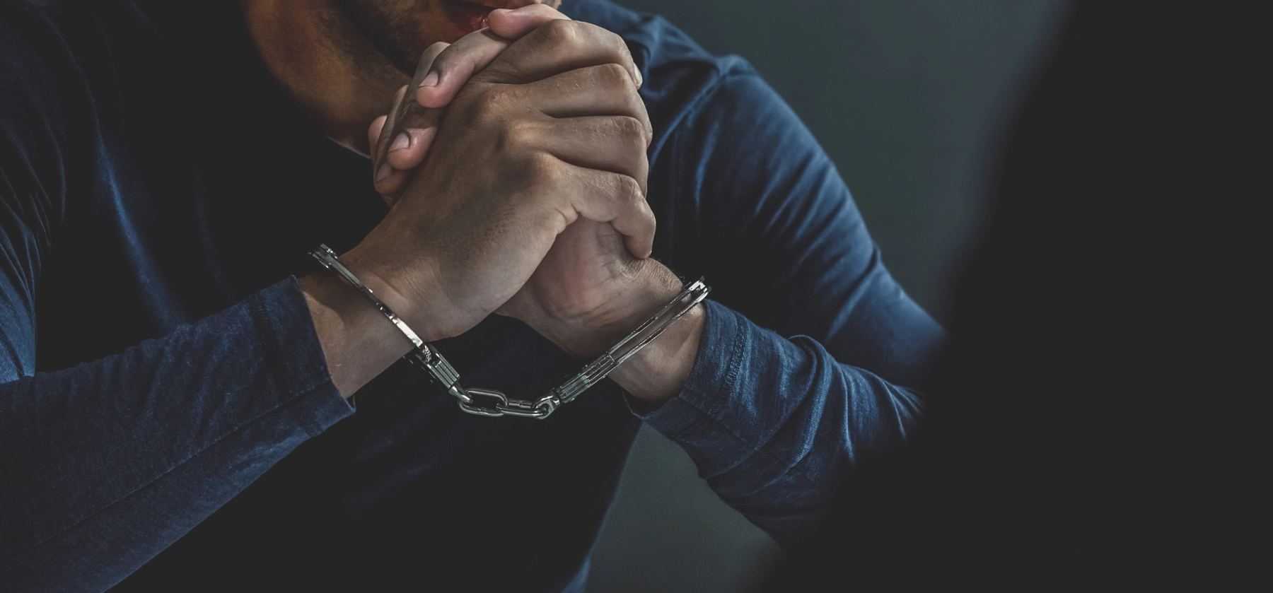 hands in handcuffs